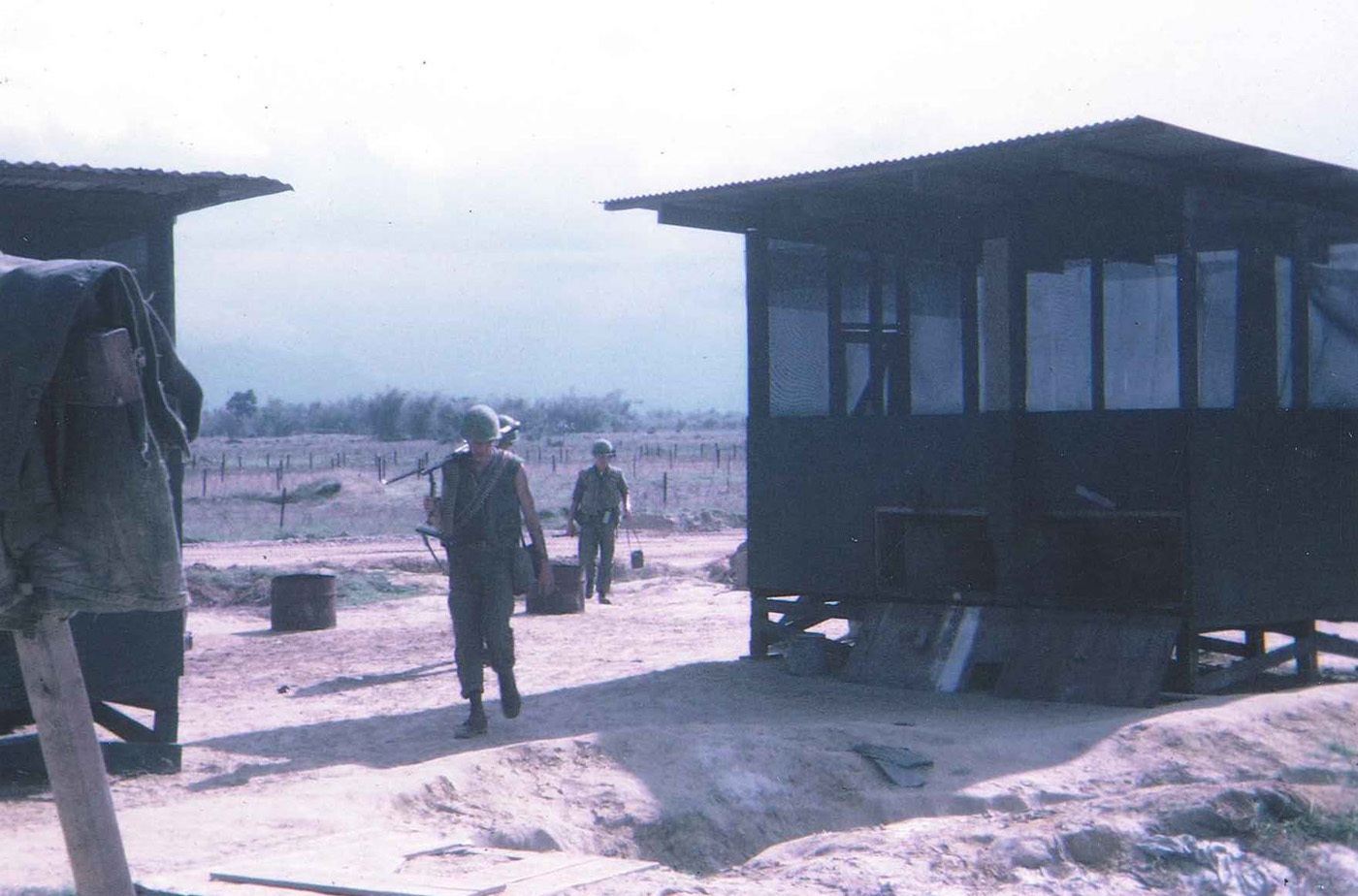 Patrol returning through south gate – An Loc December 1967