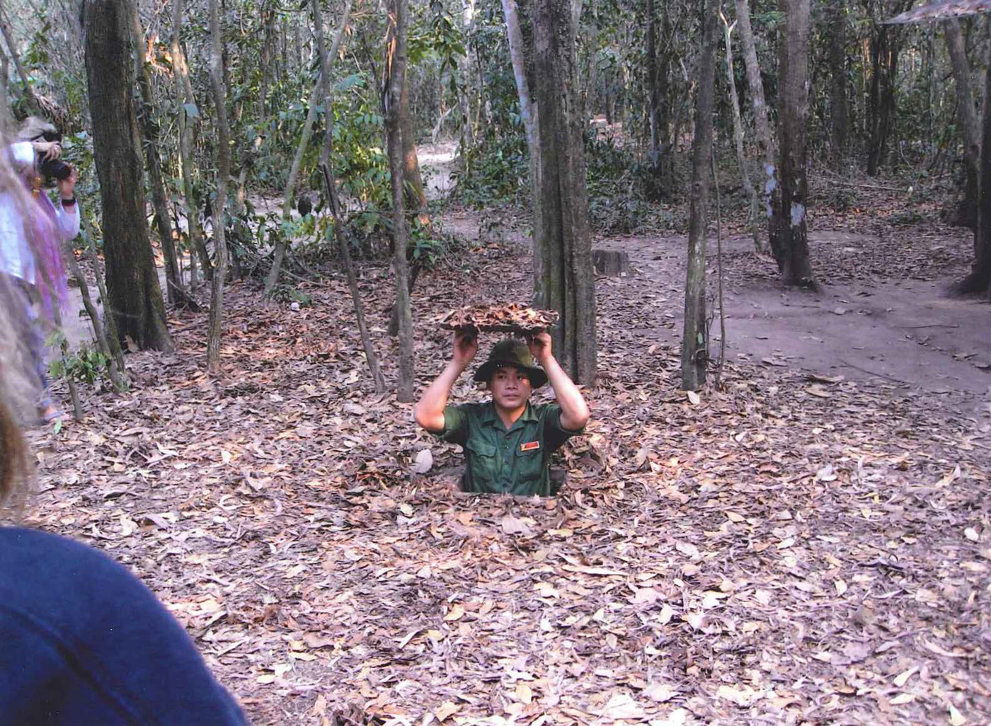 Spider hole demonstration at Chu Chi tunnels near Saigon – photo taken in March 2013
